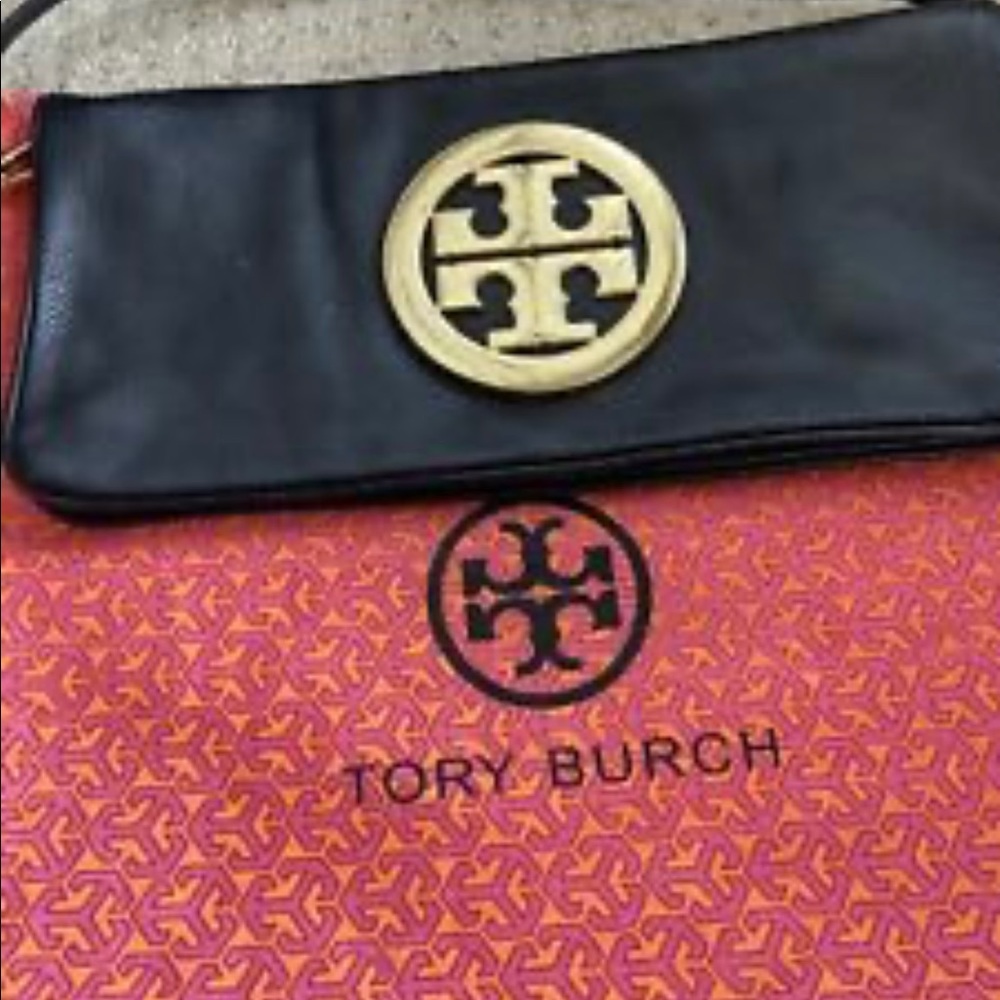 Tory Burch hand held clutch -